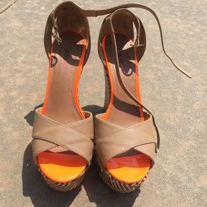 Platform wedges with woven details.